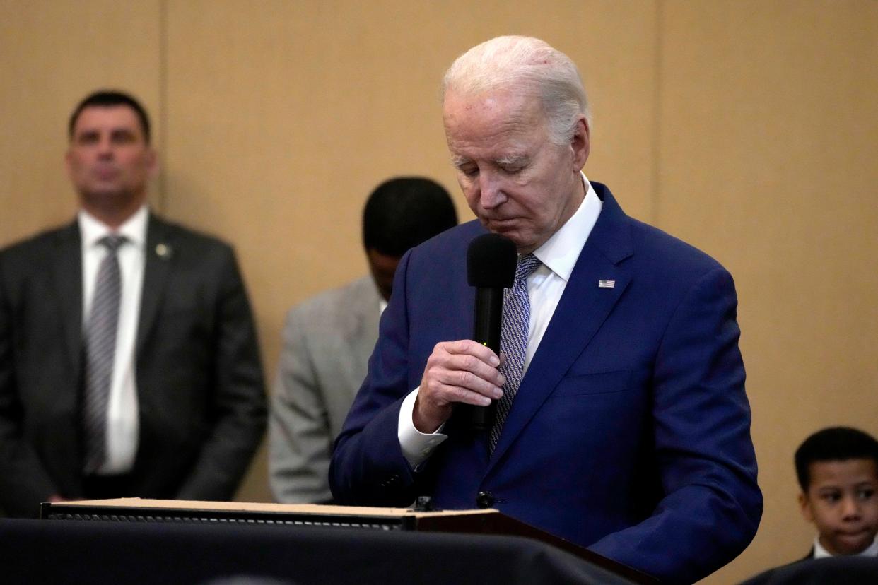President Joe Biden bows his head in a moment of silence for the three American troops killed Sunday, Jan. 28, 2024, in a drone strike in northeast Jordan, while speaking in South Carolina on Sunday, Jan. 28, 2024.