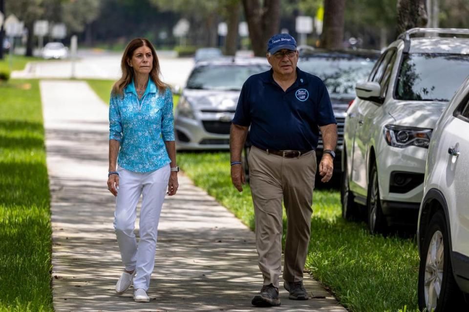 Parkland, Florida - July 5, 2023 - Linda Beigel Schulman, left, mother of geography teacher and cross country track coach Scott Beigel who died in the shooting in 2018 and her husband and Scott Beigel’s step-father Michael Schulman, right, approach members of the media after they visited the Freshman building. Family members of the shooting victims at Marjory Stoneman Douglas High School visitedthe scene of the crime. The building will be demolished now that the trials are over.