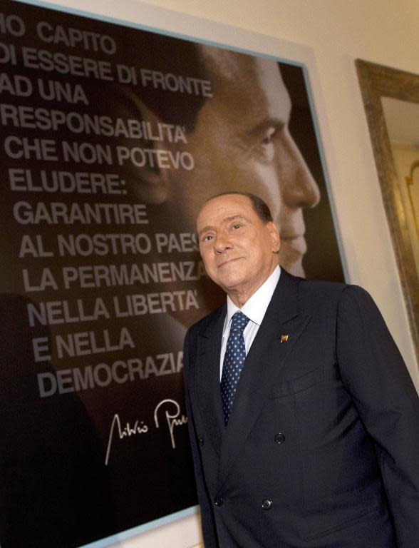 Italy's former Prime Minister Silvio Berlusconi attends the inauguration of the new PDL party headquarters, in Rome, on September 19, 2013