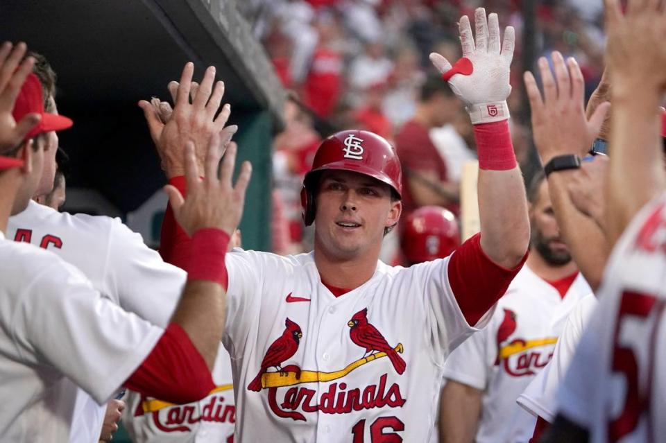 St. Louis Cardinals’ Nolan Gorman is congratulated by teammates after hitting a solo home run during the third inning of a baseball game against the Los Angeles Dodgers Tuesday, July 12, 2022, in St. Louis. (AP Photo/Jeff Roberson)