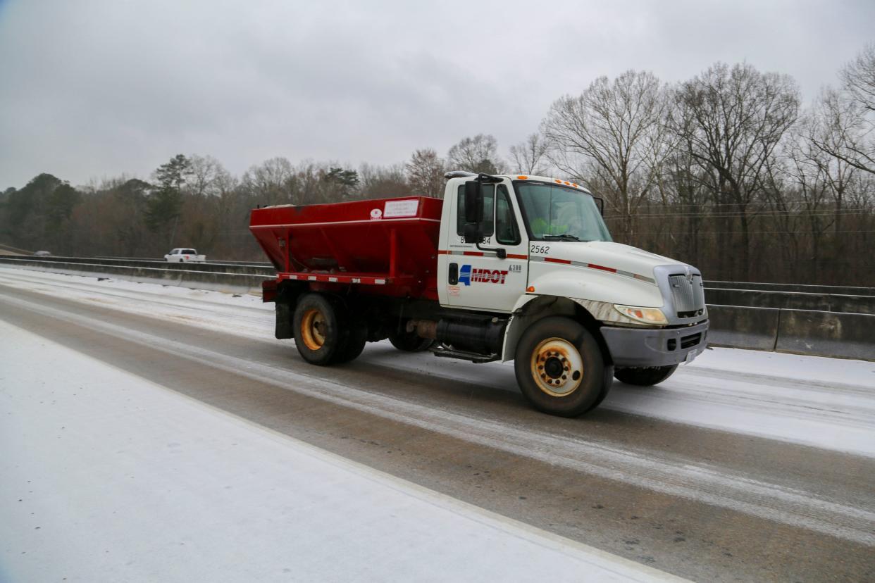 An MDOT crew treats a bridge on I-55 southbound in Hinds County during 2021 winter storm.
