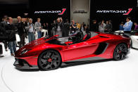 Starting with the everyday 700-hp Aventador, Lamborghini taunted the bull even further by removing the roof, adding several aerodynamic panels and generally shucking weight from a car that only had 3,472 lbs. to begin with. Even the seat fabrics have been swapped for something Lamborghini calls "Carbonskin," a fabric made from carbon fibers that's at least a decade away from being used on a teenager's hat. With no windshield, the interior has to get some form of waterproofing; the rear mirror pops up like Wall-E's head from the center of the dash. It and the roll bars behind the driver are the highest points in the car.