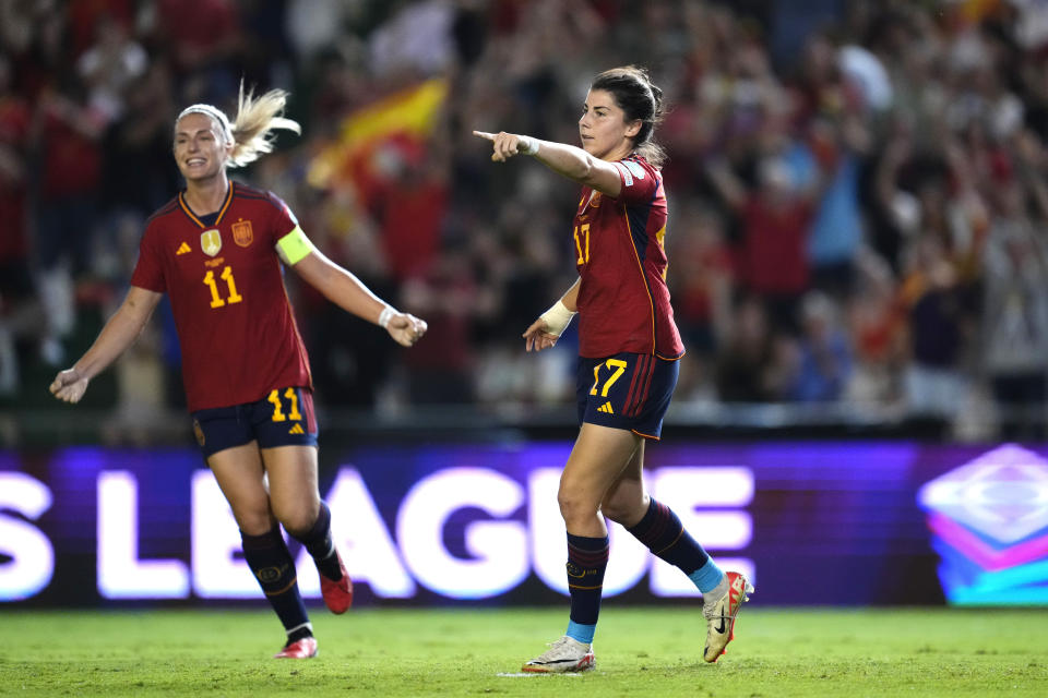 Spain's Lucía García, right, celebrates after scoring against Switzerland during the women's Nations League group D soccer match between Spain and Switzerland at the Nuevo Arcangel stadium in Cordoba, Spain, Tuesday, Sept. 26, 2023. (AP Photo/Jose Breton)