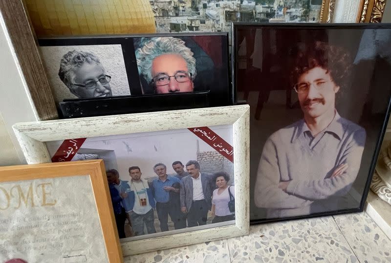 A view shows photographs of Hamma al-Hammami, a leftist activist and former political prisoner, at his home in Tunis