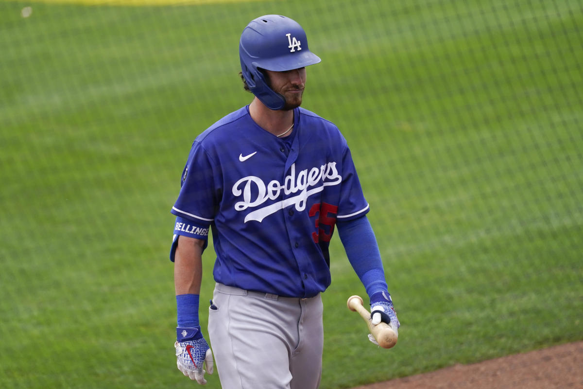 FILE - In this June 20, 2017, file photo, Los Angeles Dodgers' Cody  Bellinger, right, and Justin Turner celebrate Bellinger's two-run home run  during the first inning of a baseball game against