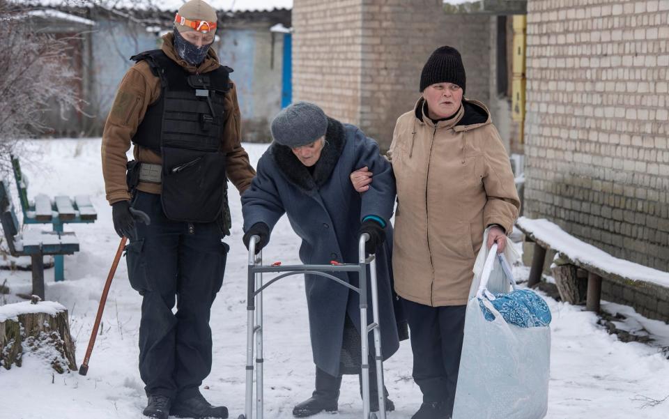 Nadezhda Mayboroda, right, back from Kyiv personally to take care of her mother, centre, a month ago - JULIAN SIMMONDS