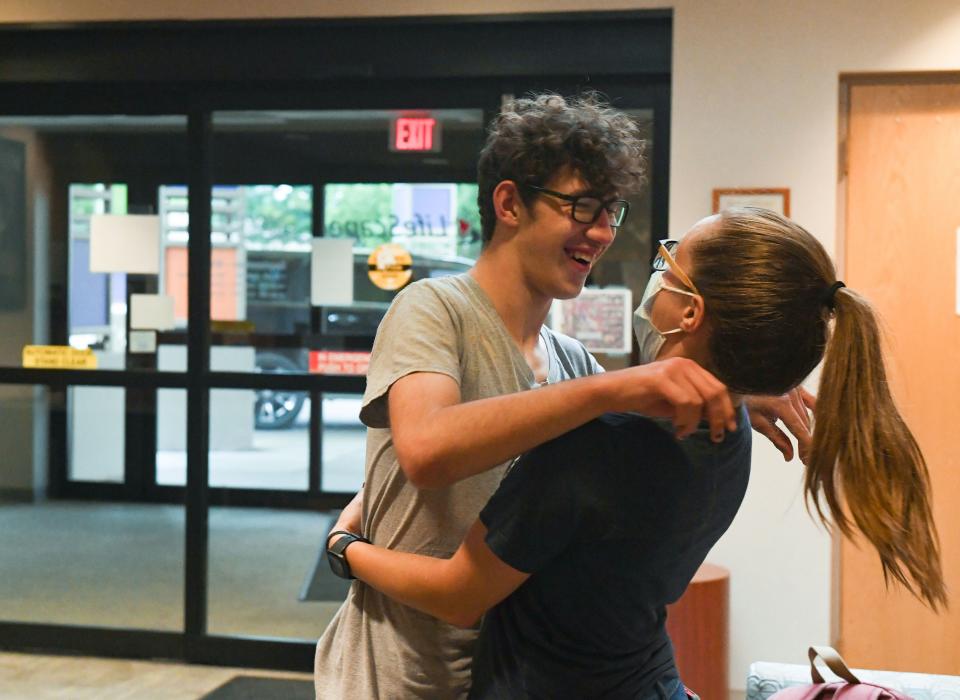 Derek Fugate, 16, hugs his former LifeScape teacher Leah Van Tol before leaving for the weekend with his father on Friday, September 3, 2021 at the LifeScape Children's Services facility in Sioux Falls.