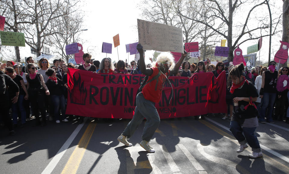 People march to protest the World Congress of Families, in Verona, Italy, Saturday, March 30, 2019. A congress in Italy under the auspices of a U.S. organization that defines family as strictly centering around a mother and father has made Verona — the city of Romeo and Juliet — the backdrop for a culture clash over family values, with a coalition of civic groups mobilizing against what they see as a counter-reform movement to limit LGBT and women's rights. (AP Photo/Antonio Calanni)