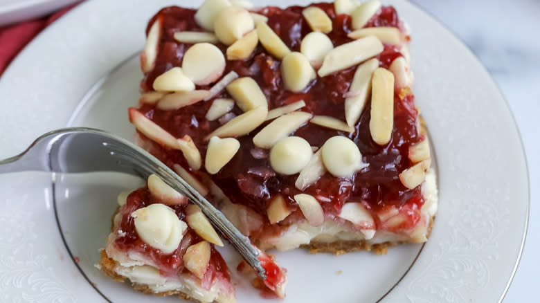 fork cutting into layer bar