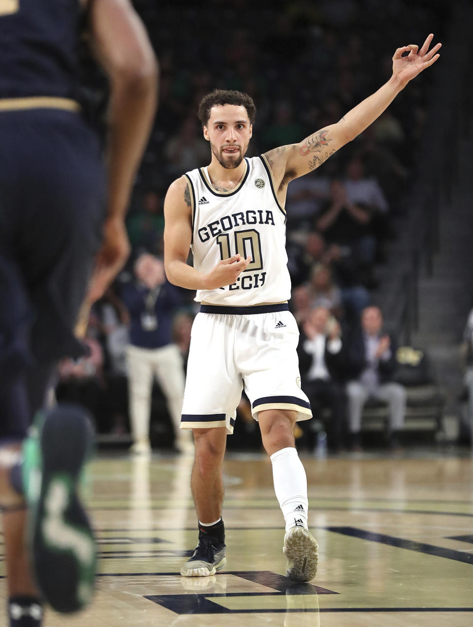 Georgia Tech guard Jose Alvarado plays air guitar after hitting a 3-pointer against Notre Dame during the first half of an NCAA college basketball game Wednesday, Jan. 15, 2020, in Atlanta. (Curtis Compton/Atlanta Journal-Constitution via AP)