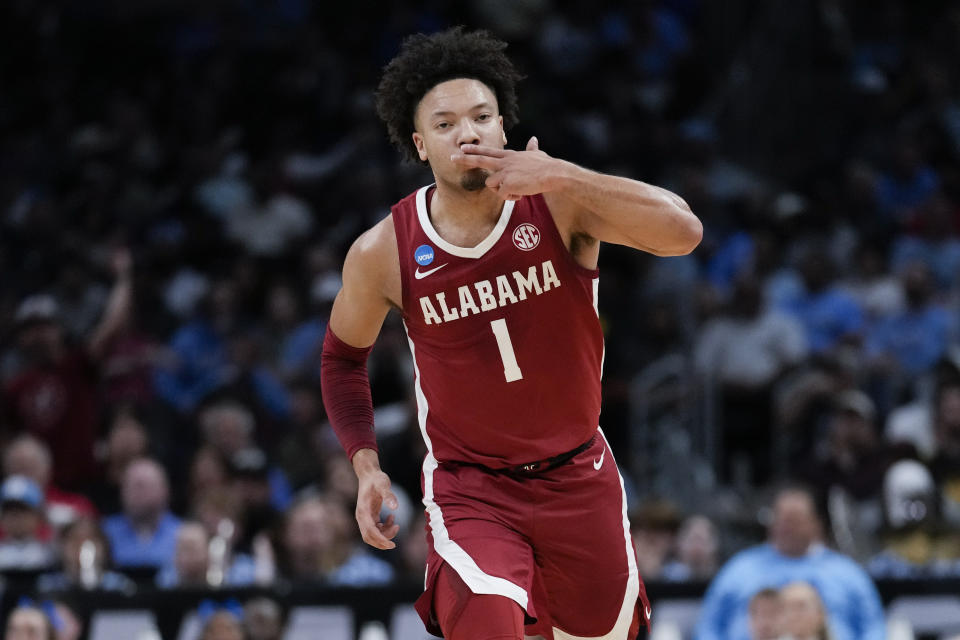 Alabama guard Mark Sears (1) reacts after scoring against North Carolina during the first half of a Sweet 16 college basketball game against North Carolina in the NCAA tournament Thursday, March 28, 2024, in Los Angeles. (AP Photo/Ashley Landis)