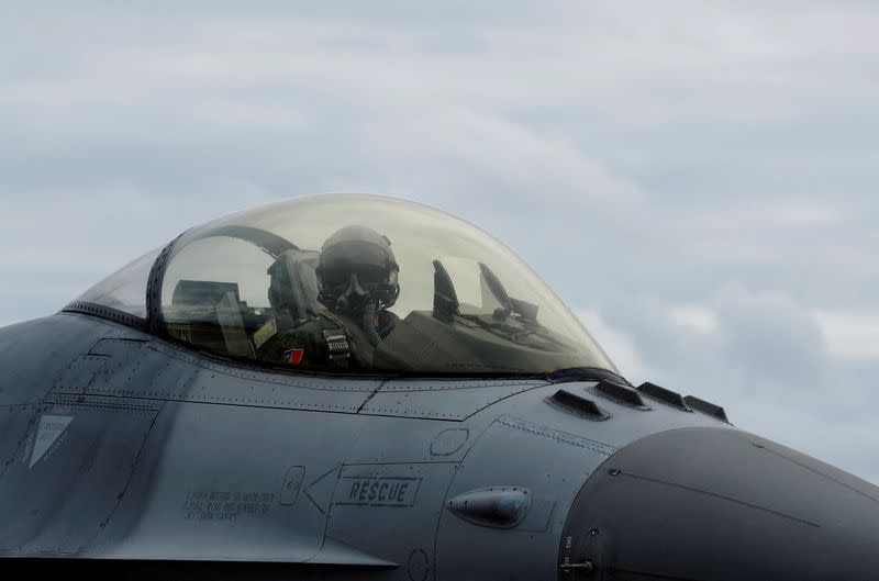 FILE PHOTO: A pilot of a F-16 fighter jet attends a military drill at Zhi-Hang Air Base in Taitung