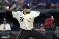 Texas Rangers pitcher Nathan Eovaldi delivers against the Cincinnati Reds during the first inning of a baseball game Friday, April 26, 2024, in Arlington, Texas. (AP Photo/Richard W. Rodriguez)