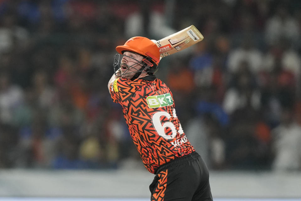 Sunrisers Hyderabad's Travis Head watches the ball after playing a shot during the Indian Premier League cricket tournament between Sunrisers Hyderabad and Mumbai Indians in Hyderabad, India, Wednesday, March 27, 2024.(AP Photo/Mahesh Kumar A.)