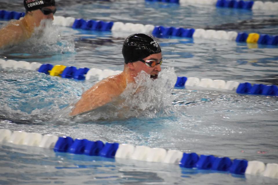 Martinsville's Blake Rains competes in the 100-yard breaststroke during sectional preliminaries at Franklin Community High School on Feb. 17, 2022.