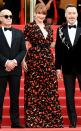 The <em>Rocketman</em> actress's printed red and black gown packs a punch at the film's premiere, which she pairs with Chopard jewelry.