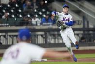 New York Mets' Brett Baty throws out Detroit Tigers' Matt Vierling at first base during the sixth inning of a baseball game Monday, April 1, 2024, in New York. (AP Photo/Frank Franklin II)