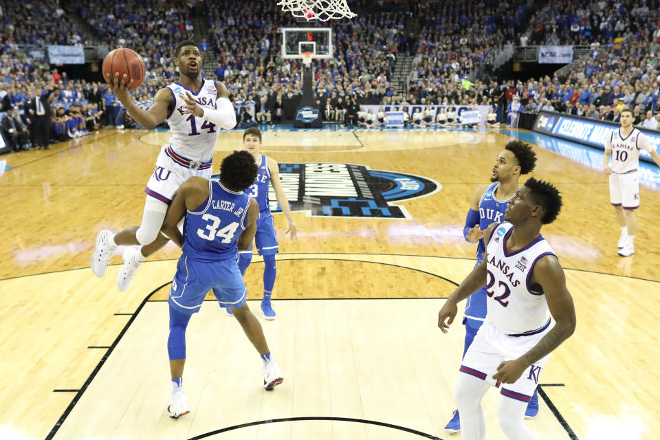 Wendell Carter was called for a block on this play in overtime of the Elite Eight game between Duke and Kansas. (Getty)