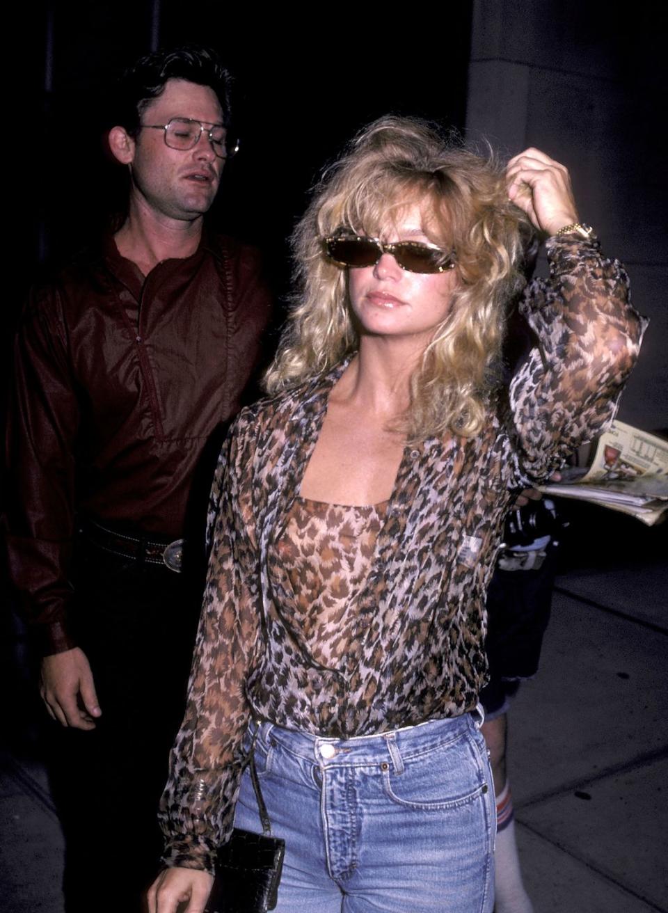 <p>Goldie Hawn absolutely owned this leopard print blouse during a night out in NYC. (Shoutout to Kurt Russell in the back!) </p>