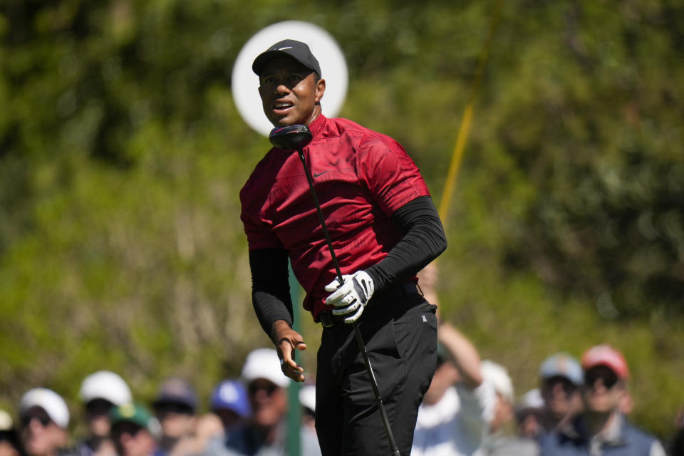 Tiger Woods watches his tee shot on the fifth hole during the final round at the Masters golf tournament on Sunday, April 10, 2022, in Augusta, Ga. (AP Photo/Jae C. Hong)