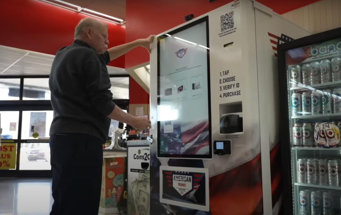 A customer uses the ammo vending machine in Pell City, Alabama