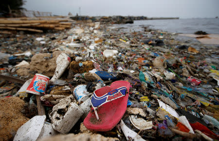 Plastic and styrofoam garbage litters the shoreline in Cilincing in Jakarta, Indonesia, Indonesia, November 26, 2018. REUTERS/Willy Kurniawan/Files