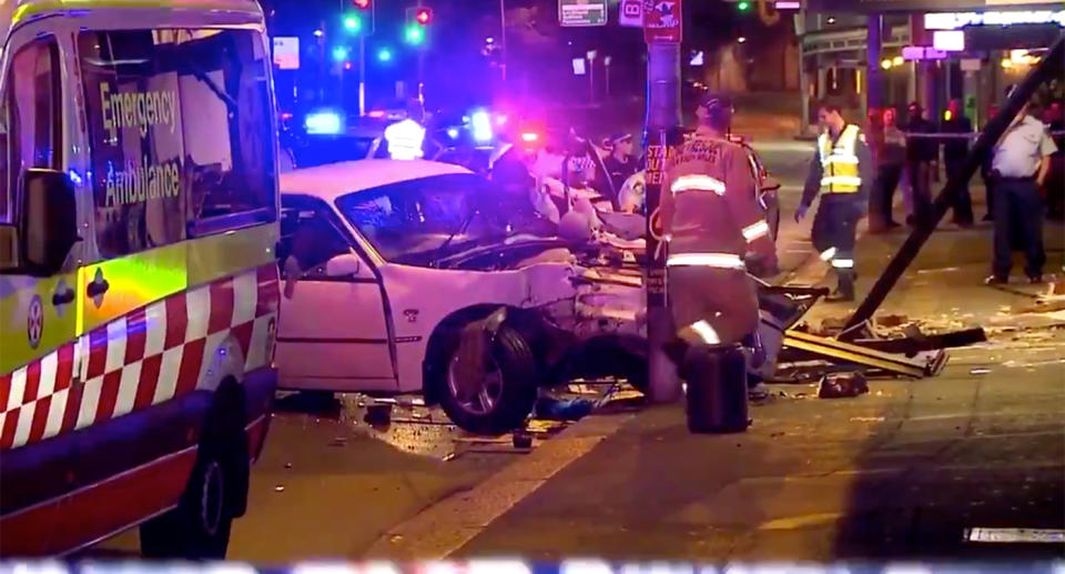 The Holden Commodore smashed into three shops at Broadway Shopping Centre. Source: 7 News