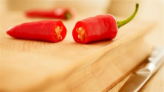 <div class="caption-credit"> Photo by: Adam Gault</div><b>Peppers</b> <br> Whether hot and spicy or sweet and crunchy, there are enough peppers out there to suit anyone's taste, and they're all equally healthy for you. Spicy chile peppers have high levels of capsaicin, which interferes with your mind's pain receptors, and therefore act as natural painkillers. Capsaicin, which gives peppers their heat, has also been found to aid in weight loss by keeping your metabolism in check. Sweet peppers have a similar compound called dihydrocapsiate that comes without the spicy kick of capsaicin but with the same effects on pain and weight loss. They also contain loads of vitamin C and beta-carotene. Toss a few spicy peppers into your next batch of tacos or Asian stir-fry; bell peppers retain most of their vitamins when eaten raw. <p>   <b><a rel="nofollow noopener" href="http://wp.me/p1rIBL-1JK" target="_blank" data-ylk="slk:The Calories in Watermelon;elm:context_link;itc:0;sec:content-canvas" class="link ">The Calories in Watermelon</a></b><a rel="nofollow noopener" href="http://wp.me/p1rIBL-1JK" target="_blank" data-ylk="slk:;elm:context_link;itc:0;sec:content-canvas" class="link "><br></a> </p>