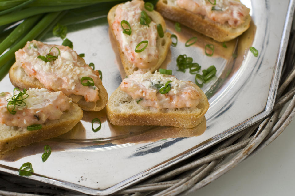 In this image taken on January 14, 2013, baked sesame shrimp toasts are shown served on a tray in Concord, N.H. (AP Photo/Matthew Mead)