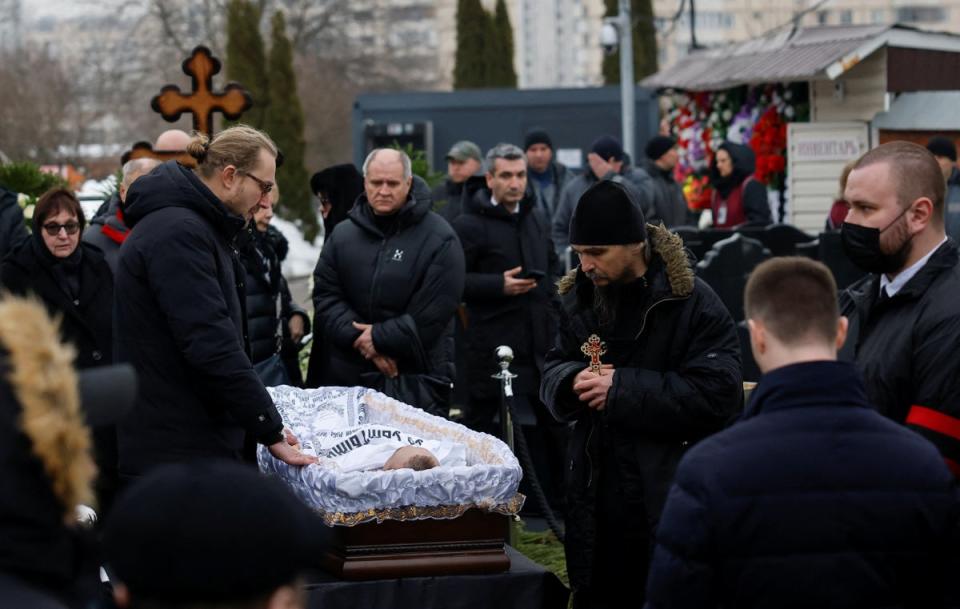 People attend the funeral of Russian opposition politician Alexei Navalny at the Borisovskoye cemetery in Moscow, on Friday (REUTERS)