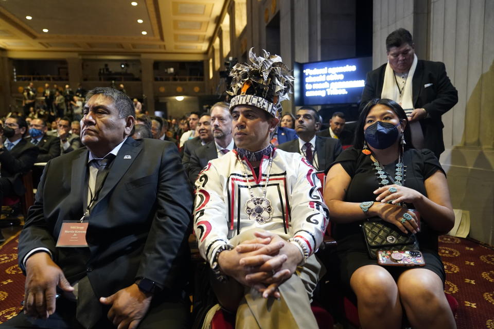 Audience members listen as President Joe Biden speaks at the White House Tribal Nations Summit at the Department of the Interior in Washington, Wednesday, Nov. 30, 2022. (AP Photo/Patrick Semansky)