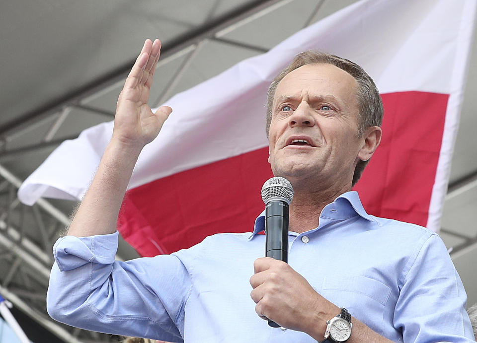 European Union Council President Donald Tusk leads a march celebrating Poland's 15 years in the EU and stressing the nation's attachment to the 28-member bloc ahead of May 26 key elections to the European Parliament, in Warsaw, Poland, Saturday, May 18, 2019.(AP Photo/Czarek Sokolowski)