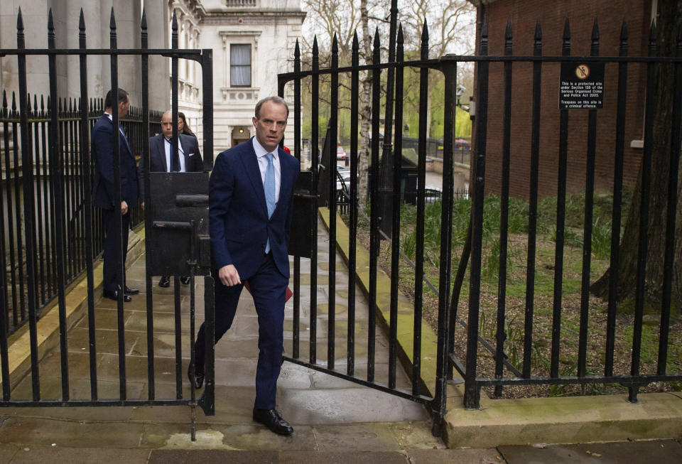 Britain's Foreign Secretary Dominic Raab arrives in Downing Street, London, Monday April 6, 2020, after Prime Minister Boris Johnson was admitted to a hospital for tests, 10 days after being diagnosed with the new coronavirus. Johnson’s office said he was hospitalized Sunday because he still has symptoms, but it is not an emergency. (Dominic Lipinski/PA via AP)