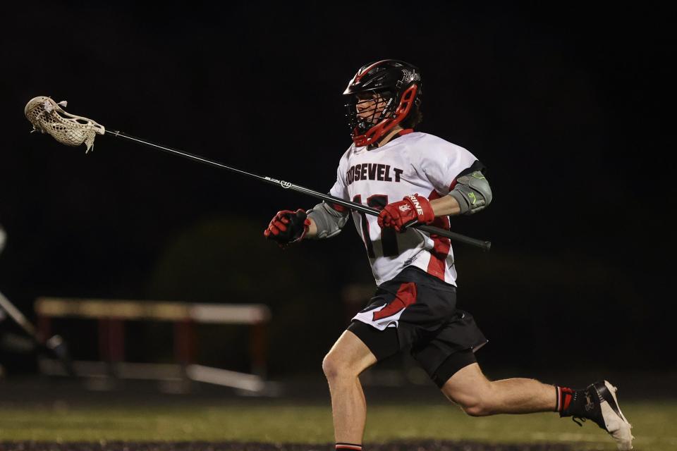 Kent Roosevelt senior Patrick Kirby sprints downfield with the ball during a 2022 game against Brecksville-Broadview Heights at Roosevelt Stadium.