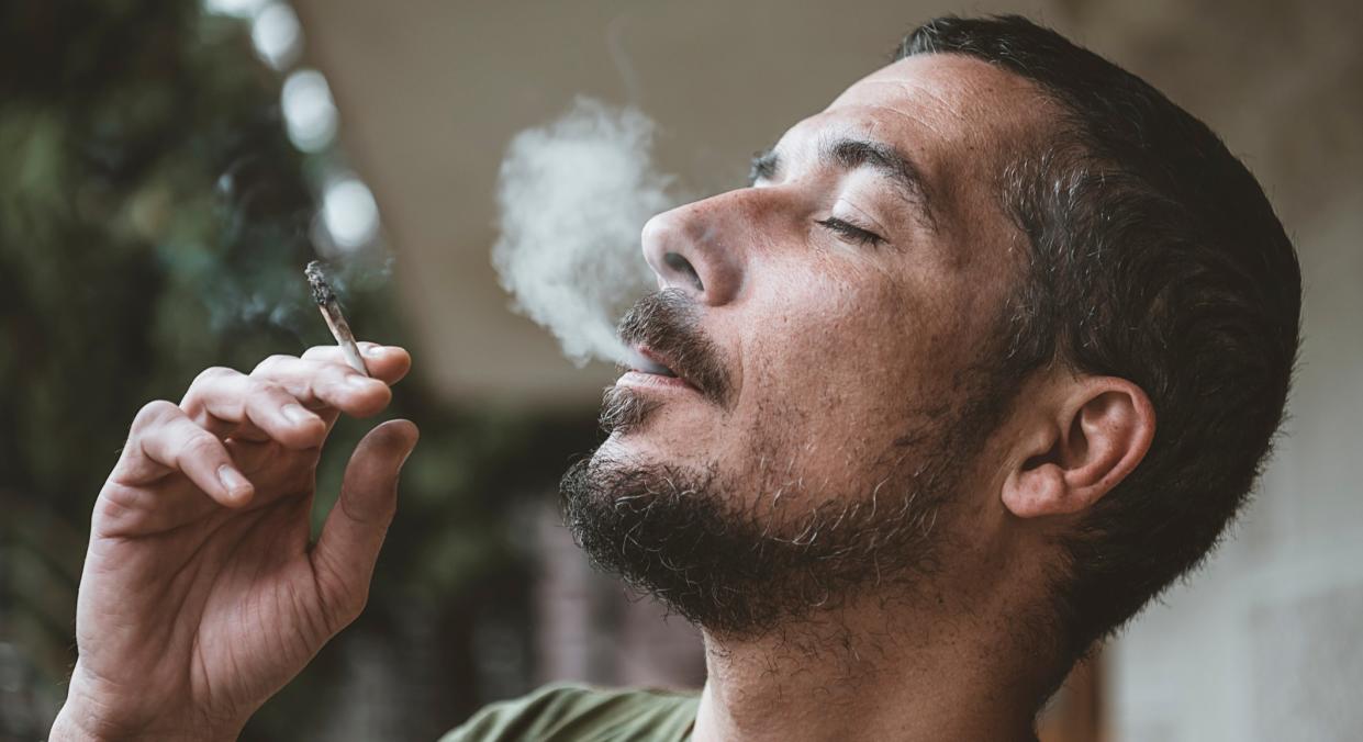 Men who regularly smoke cannabis are at greater risk of testicular cancer [Image: Getty]