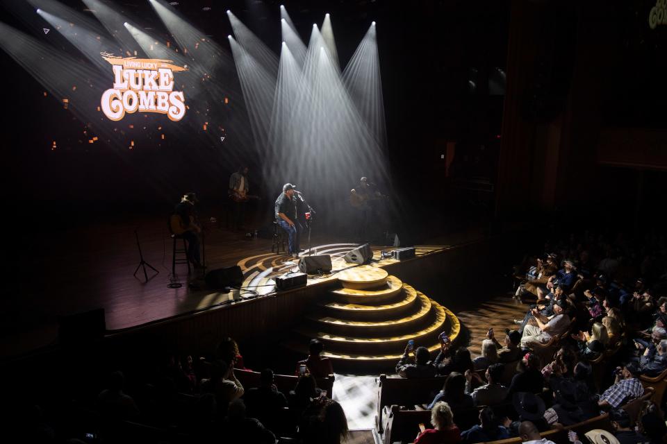 Luke Combs plays during the Living Lucky With Luke Combs performance at the Ryman Auditorium in Nashville on Feb. 6,.