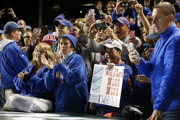 Cubs fans celebrate the NL pennant. (AP)