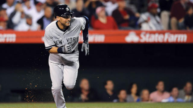 New York Yankees shortstop Derek Jeter (2) fields a ground ball as