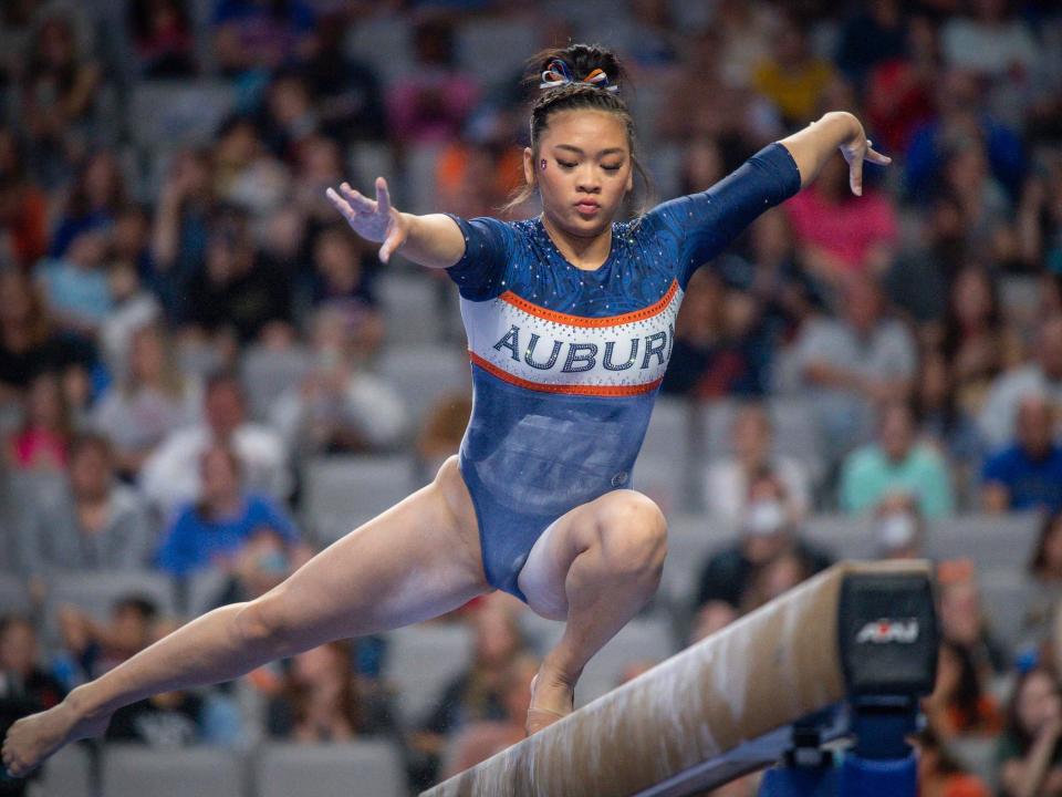 Olympic all-around champion Suni Lee competes for Auburn at the 2022 NCAA Women's Gymnastics Championship.