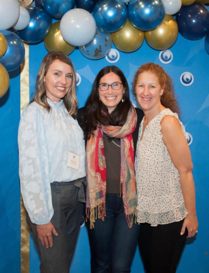 Incoming Seacoast Women’s Giving Circle chair, Steph Diehl, center, and outgoing co-chairs Heidi Hanson, left, and Karen Dawson, right, celebrated the organization’s milestone $1 million raised over the past 16 years and $110,000 raised for this year’s grant recipients at the annual Give Event held on May 11, 2022 at the Museum of New Art in Portsmouth.