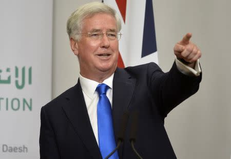 Britain's Defence Secretary Michael Fallon attends a press conference with U.S. Secretary of Defence Ash Carter at the Foreign Office in London, December 15, 2016. REUTERS/Hannah McKay