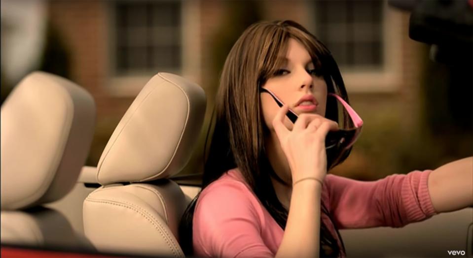 Also playing the mean girl, Swift donned a brunette wig for the role. She's also <a rel="nofollow noopener" href="https://people.com/country/cmt-awards-2018-taylor-swift-sugarland-babe-music-video-teaser/" target="_blank" data-ylk="slk:sported wigs in several other music videos;elm:context_link;itc:0;sec:content-canvas" class="link ">sported wigs in several other music videos</a>, including for "Babe," "Bad Blood," "Wildest Dreams" and more.
