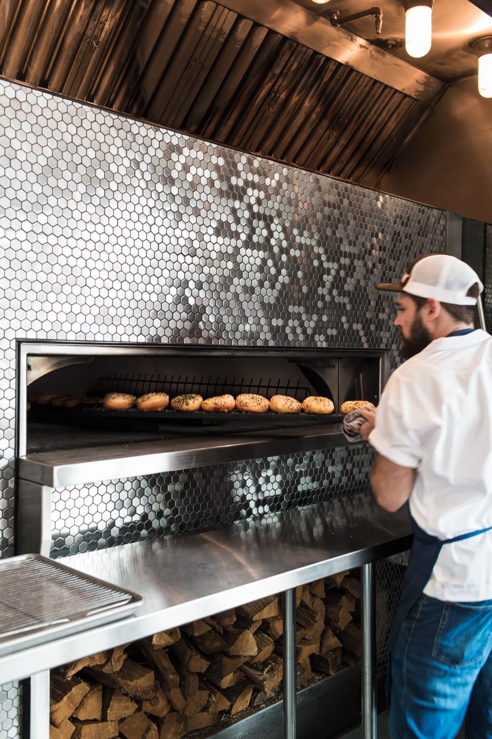 Bagels coming out of the oven at Meyvn.