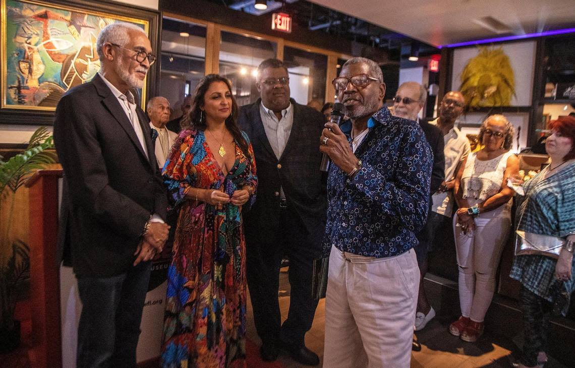 Jimmy Moise (far right), founder of the Le P’ti Club, introduces (from left) Haitian artists Philippe Dodard, Claudia Apaid and Jean-Jacques Stephen, during the 2022 Caribbean Fine Art Exhibit and Awards.