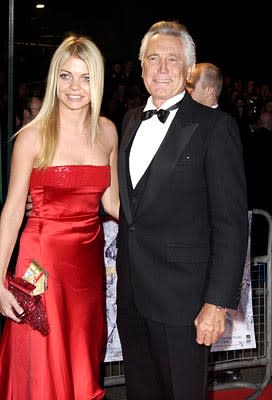 Model Gemma Kidd and Living Trivia Question George Lazenby at the London gala premiere of MGM's Die Another Day