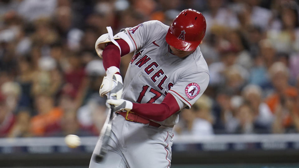 Los Angeles Angels' Shohei Ohtani hits a solo home run against the Detroit Tigers in the eighth inning of a baseball game in Detroit, Wednesday, Aug. 18, 2021. (AP Photo/Paul Sancya)