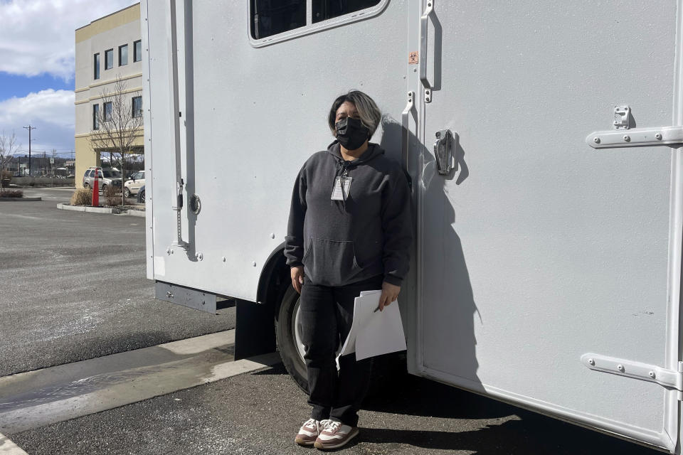 Rosa Johnson poses outside her mobile needle exchange in Reno, Nev., Tuesday, March 7, 2023. With U.S. overdose fatalities at an all-time high, state legislatures are considering tougher penalties for possession of fentanyl, the powerful opioid linked to most of the deaths. Proponents say prosecutors and police need more tools to help with the fight because fentanyl and other synthetic opioids are so deadly, accounting for the majority of U.S. overdose deaths. (AP Photo/Gabe Stern)