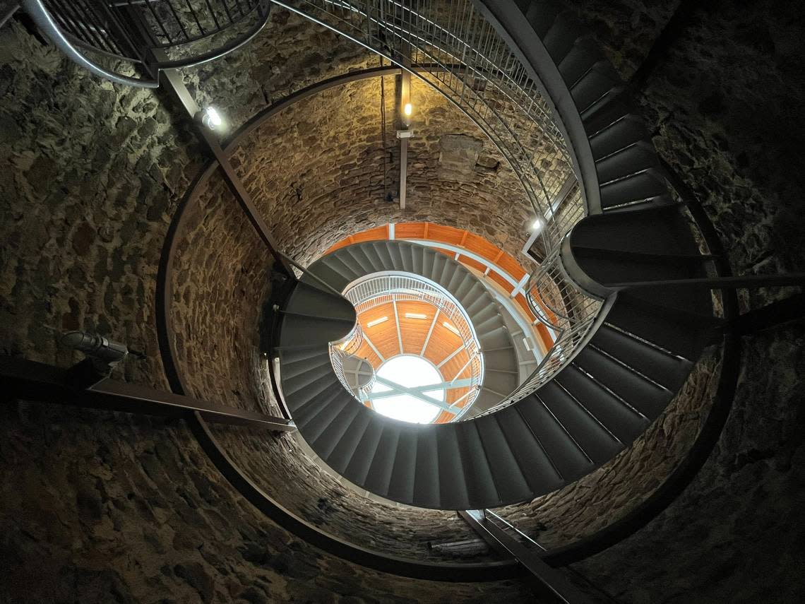 Tourists use this spiral staircase to descend into the 109-foot-deep Big Well in Greensburg.