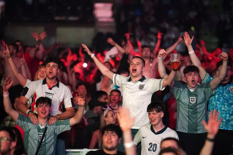 England fans celebrate at the AO Arena