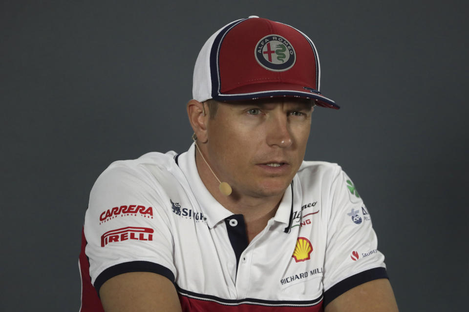 FILE - Alfa Romeo driver Kimi Raikkonen of Finland speaks during a news conference at the Yas Marina racetrack in Abu Dhabi, United Arab Emirates, Nov. 28, 2019. Räikkönen will again enter a NASCAR Cup Series race, this time at Circuit of the Americas, where the Finnish driver scored the final victory of his Formula One career in 2018. Räikkönen will again race for Trackhouse Entertainment Group in its special Project91 entry that is designed to give a seat in NASCAR to drivers from others disciplines. (AP Photo/Hassan Ammar, File)